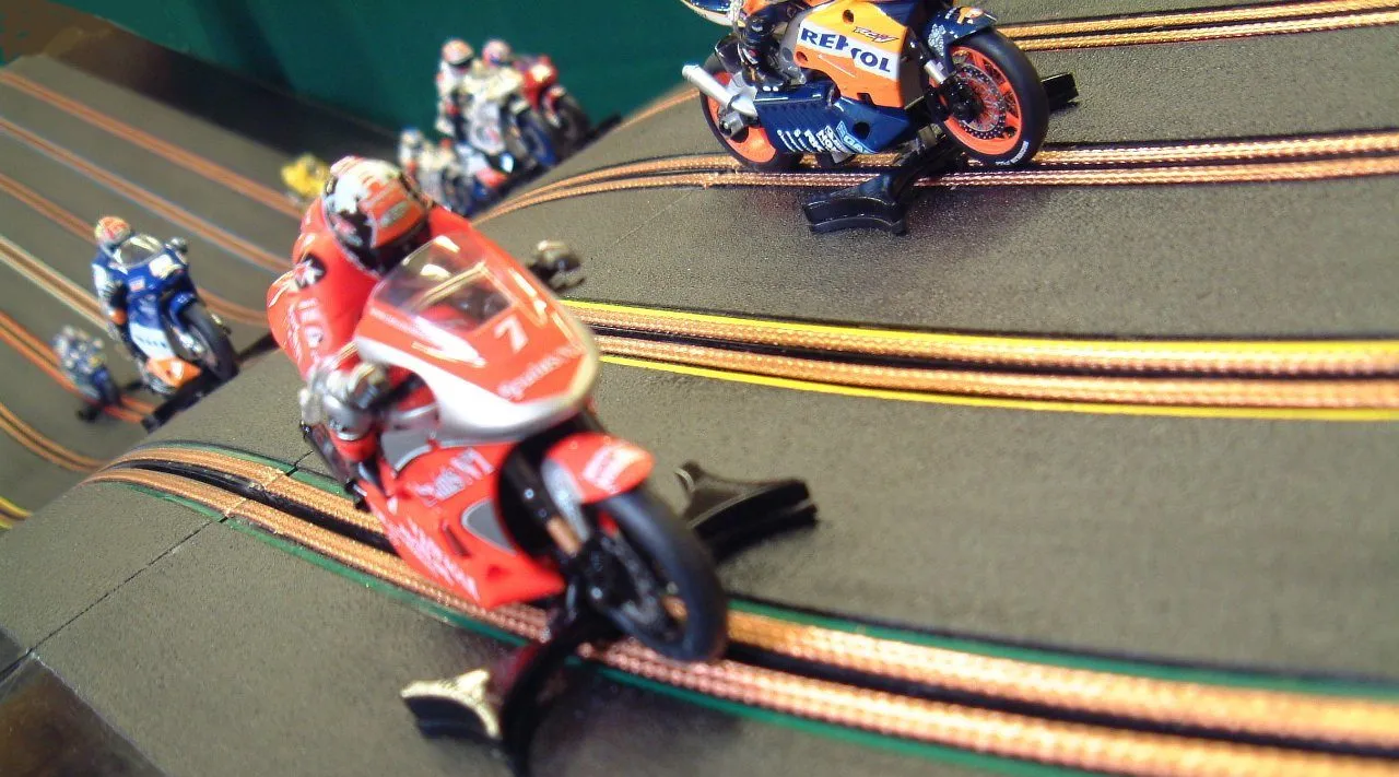motorbikes racing themed event racing track hire for parties miniracing.com Giant Scalextric 8 Lane track racing with custom made moto GP motorbikes